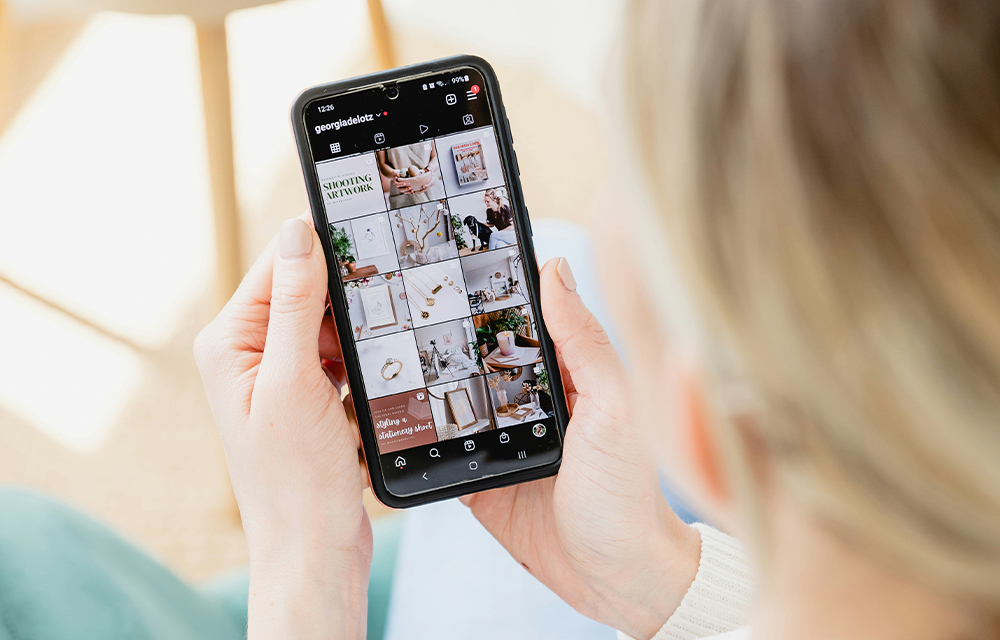 A woman checking her instagram profile